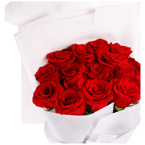 A bouquet of red roses with a white wrapper view 2