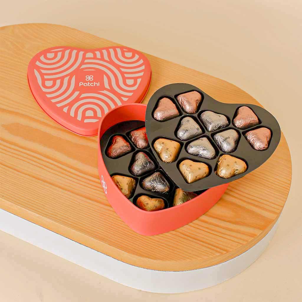 Patchi Tin Box of 22 Pieces and 9 red roses view 4