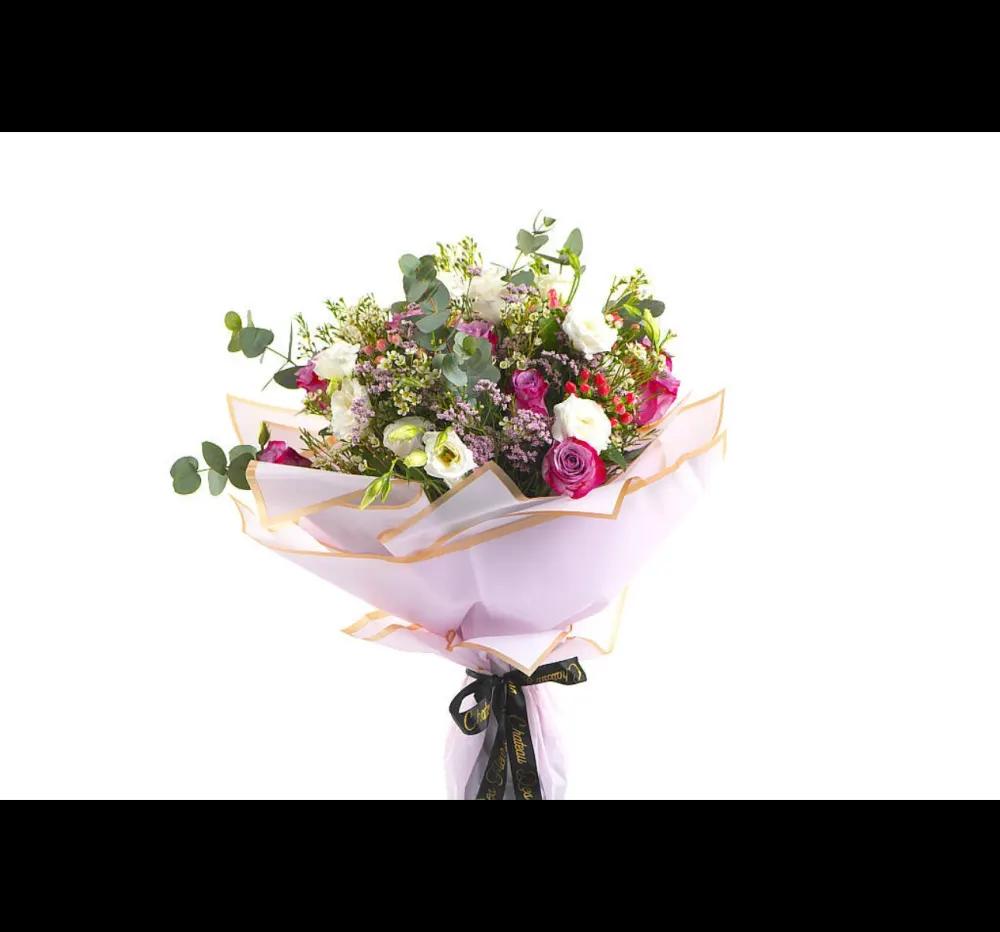 Wrap pink paper with black ribbon.undefined