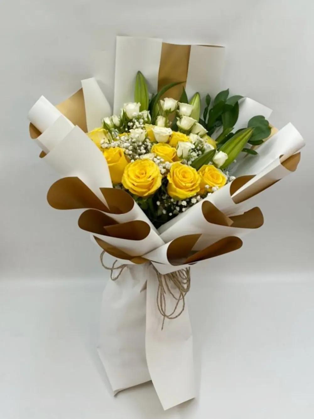 Yellow rose bouquet with gypsum seeds..undefined