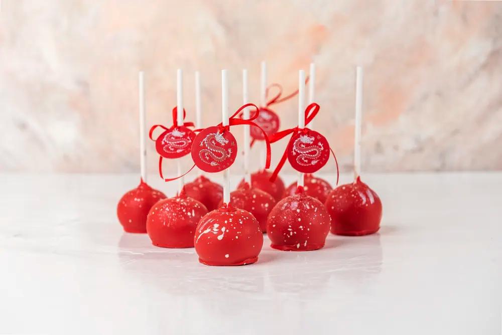 Year of Dragon Special Cake Pops by NJDYear of Dragon Special Cake Pops by NJD, Luxury Cake Pops Gift, Festive Cake Pops UAE, كيك بوبس فاخر, هدية كيك بوبس للمناسبات, كيك بوبس سنة التنين المميزة من NJD