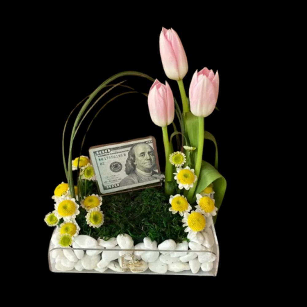 A box decorated with stones and special flowers for special occasionsundefined