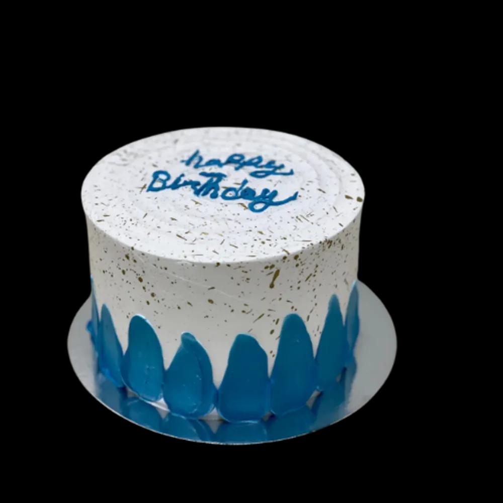 Birthday cake with white cream and blue decorationundefined