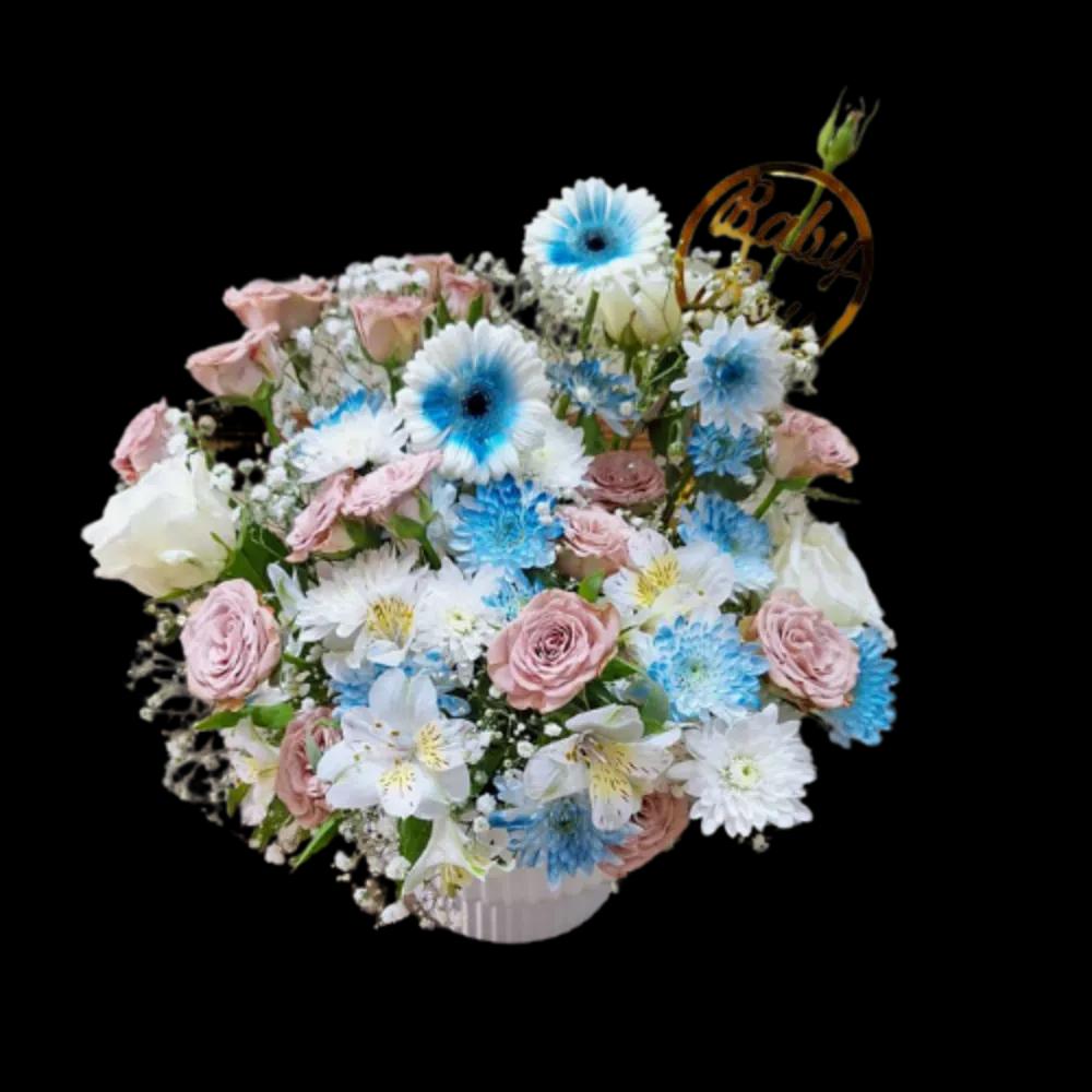 A large vase with many different colors of rosesundefined