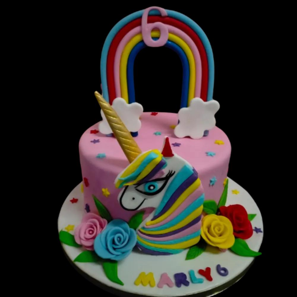 Unicorn cake with colorful rosesundefined