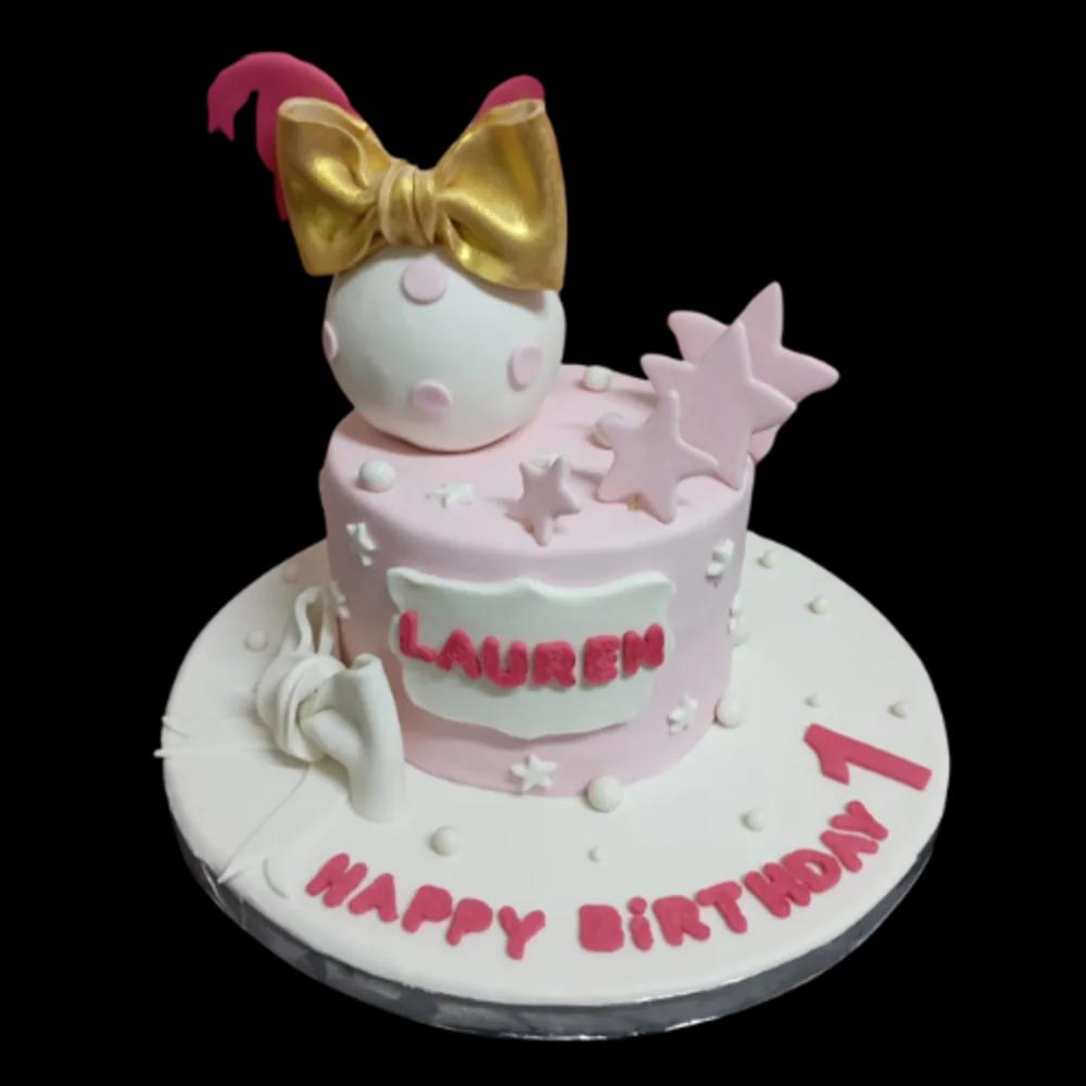 Golden bow cakeundefined