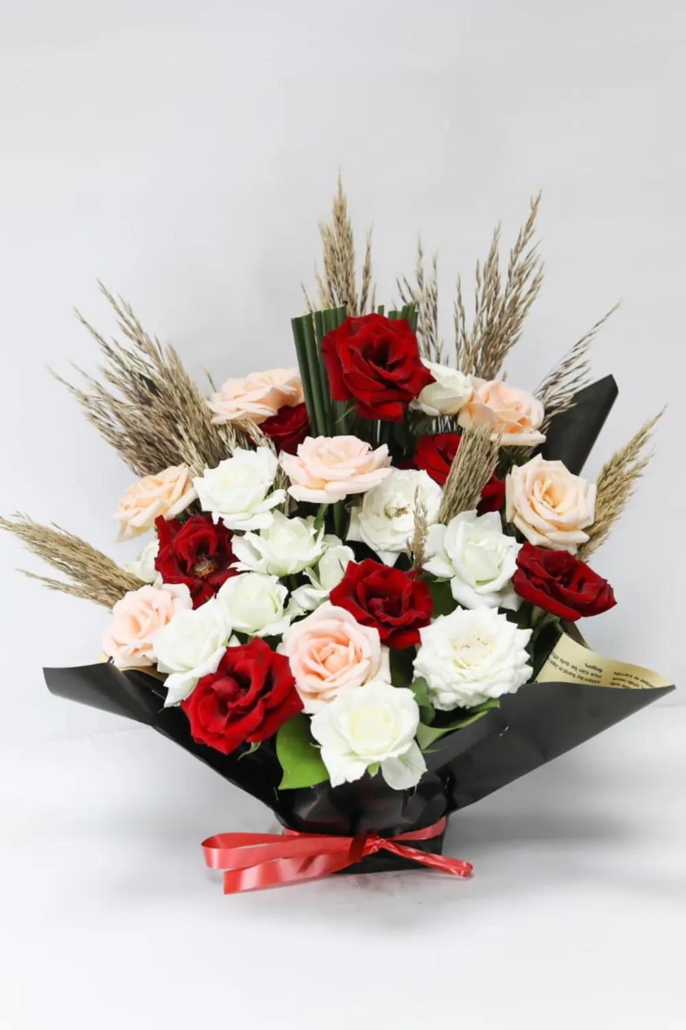 Bouquet of white and colorful roses 1undefined