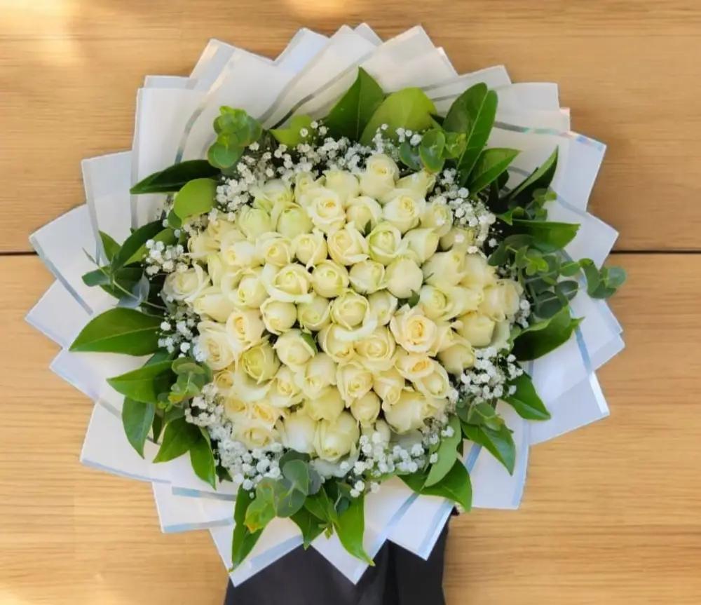 60 white roses bouquetundefined