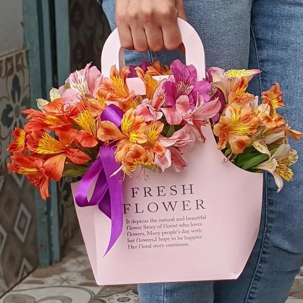 Handbag with multi-colored alstroemeriaundefined