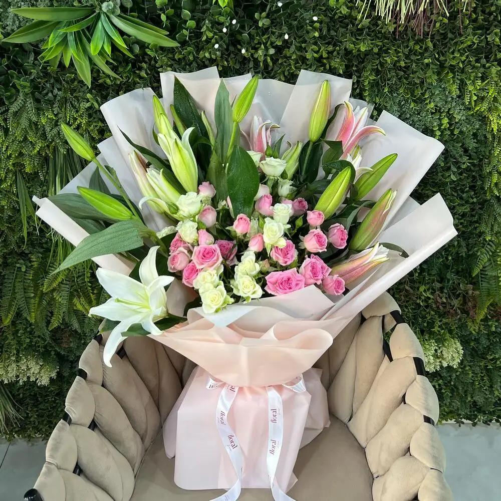 fantasy bouquet with orange ribbon