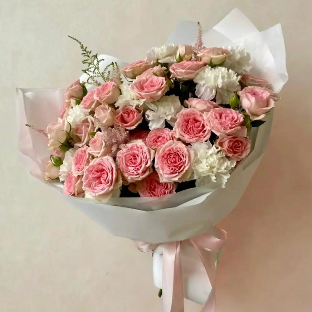 Pink rose bouquet with white wrapping