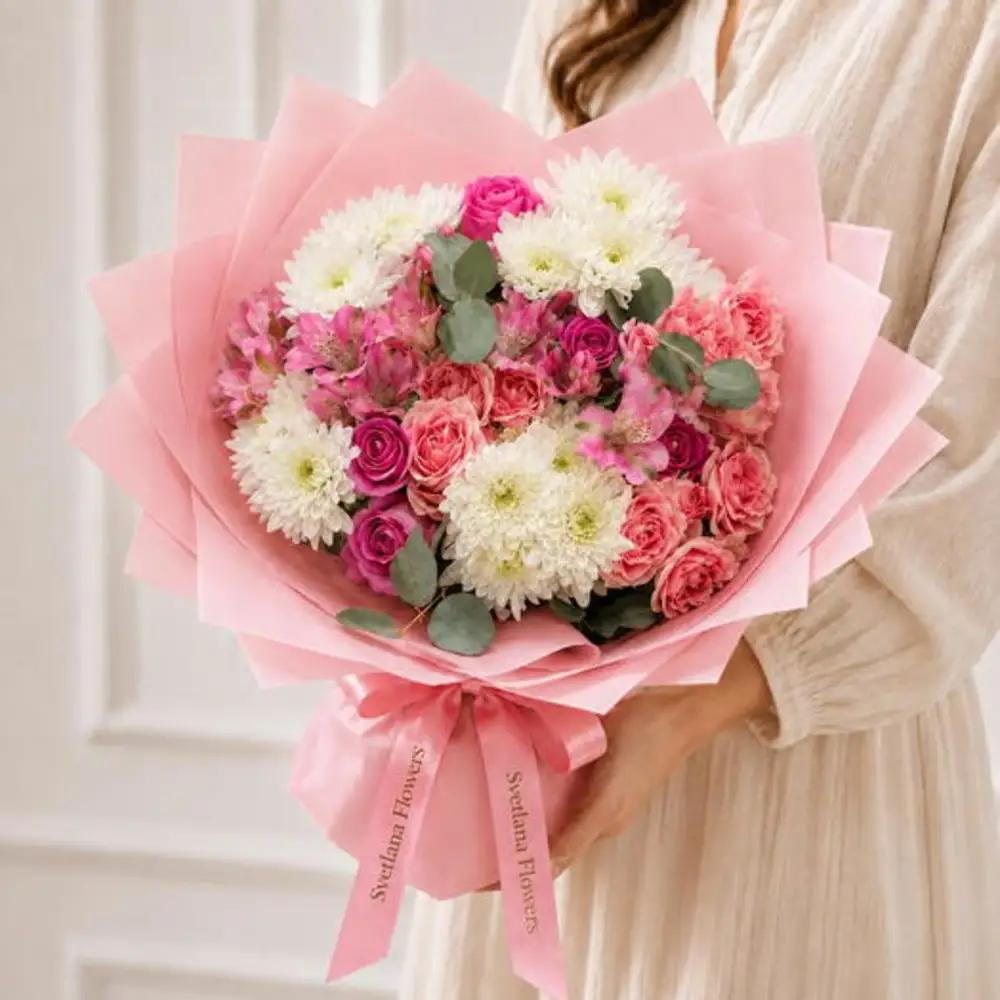 Pink and white flowers bouquet with eucalyptus