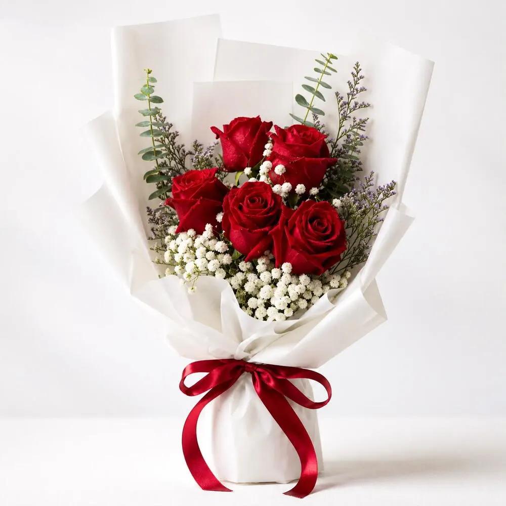 Red rose bouquet with decoration. 2